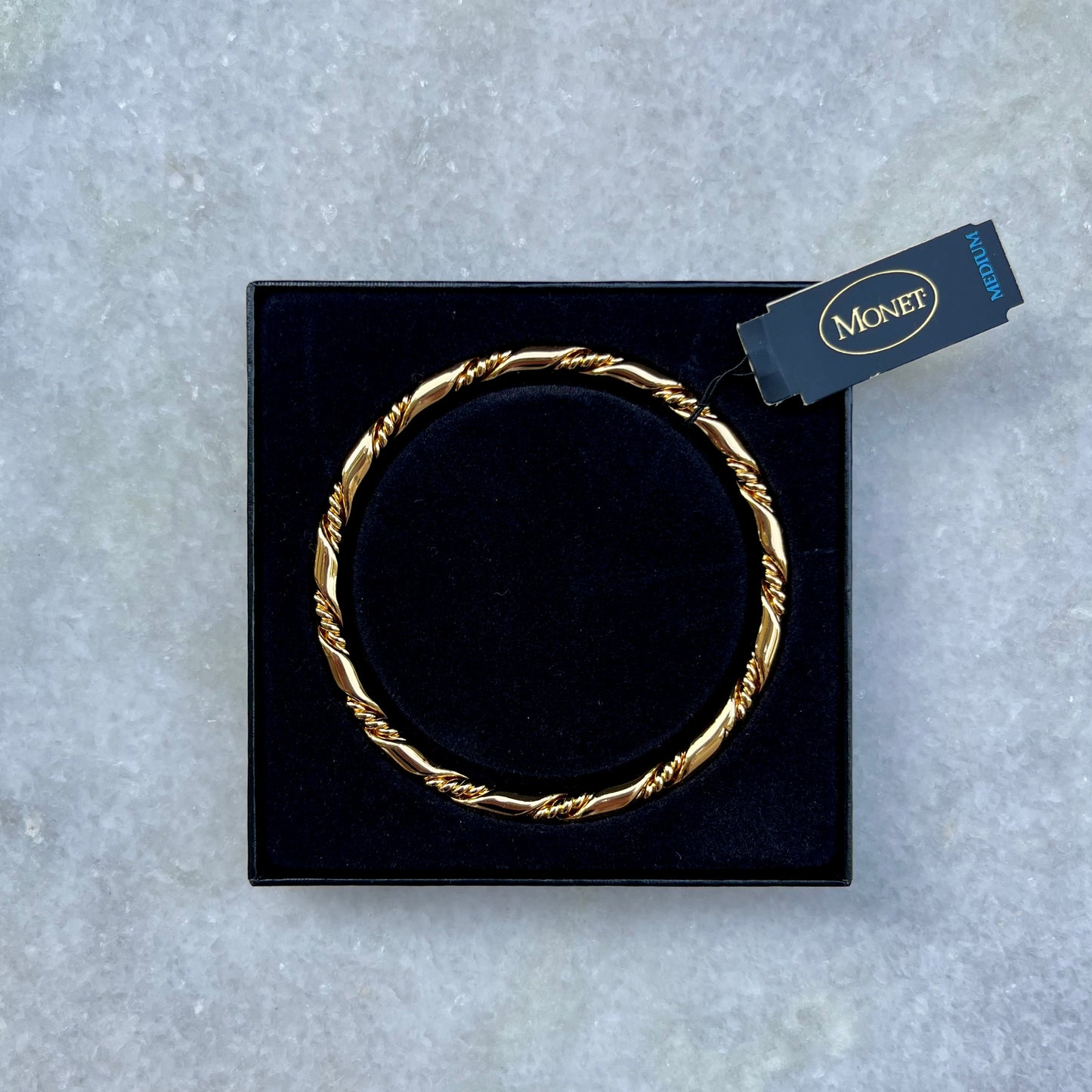 Monet Gold Plated Twist Bangle in Box