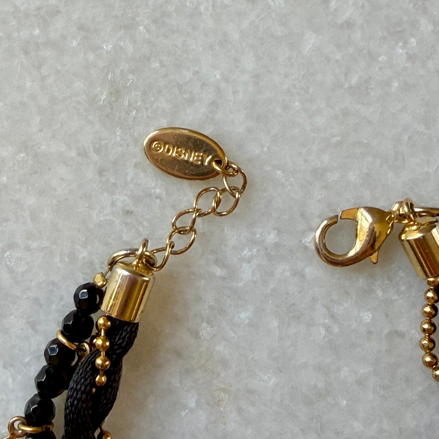 Disney Couture Black and Gold Tinkerbell Charm Bracelet